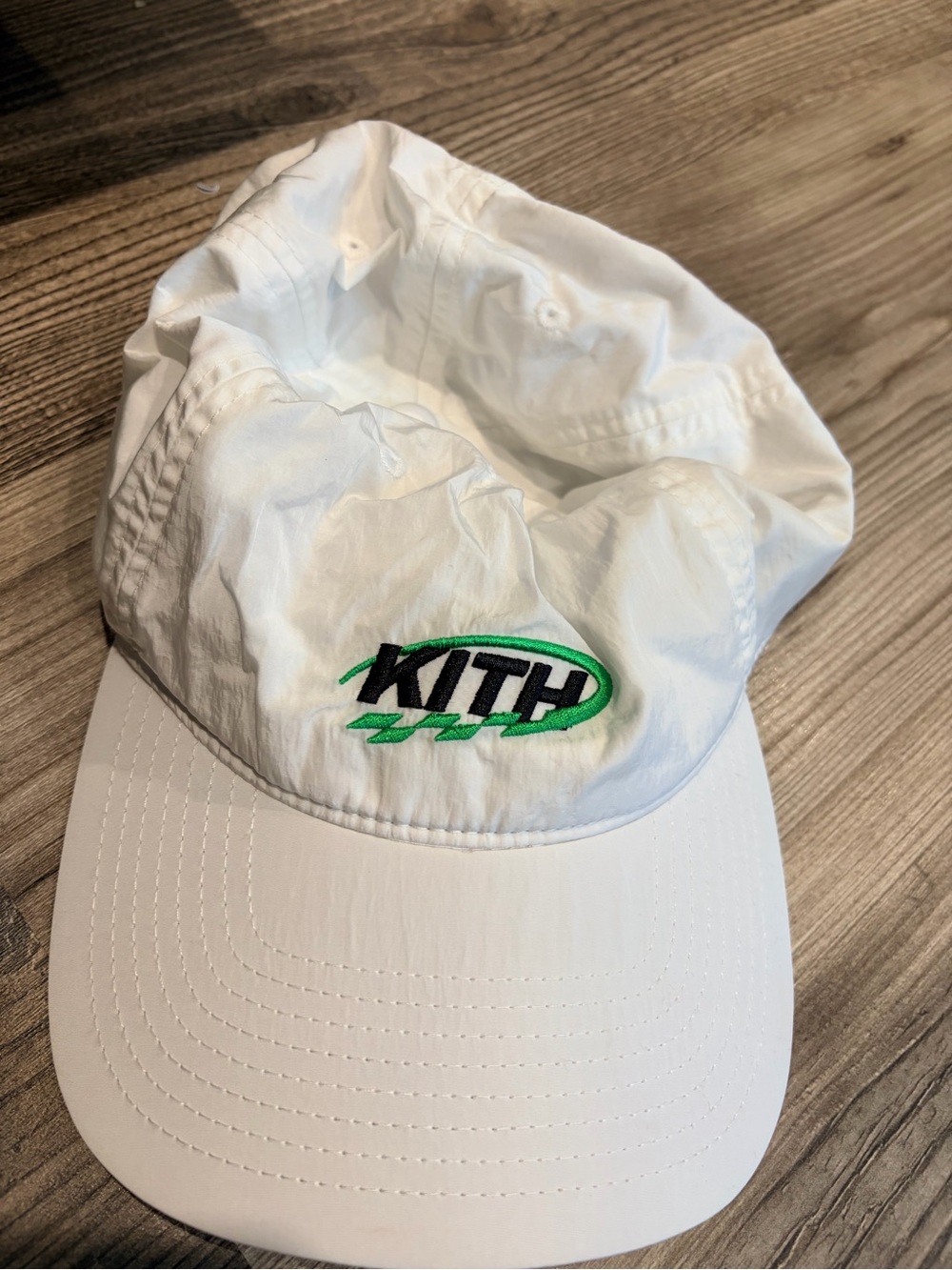 Kith White Cap with Black and Green Embroidered Logo